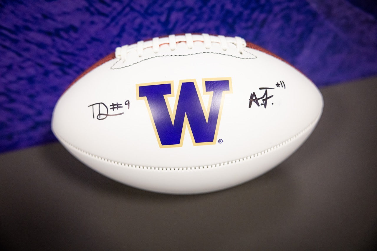 Alphonzo Tuputala and Thaddeus Dixon Signed Football